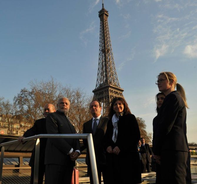 Prime Minister Narendra Modi with French President Francois Hollande on a boat ride down the Seine, April 2015.