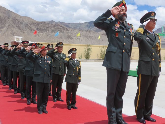 An Indian Army brigadier and a People's Liberation Army senior colonel take the salute in the Daulat Beg Oldie area along the Line of Actual Control in the Ladakh sector of Jammu and Kashmir. Kindly note that the image has been published only for representational purposes.