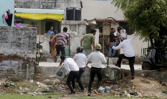 Police resort to a lathicharge after violent clashes in Ahmedabad. Photograph: PTI Photo