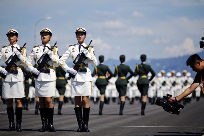 People's Liberation Army soldiers march in Beijing. Photograph: Damir Sagolj/Reuters