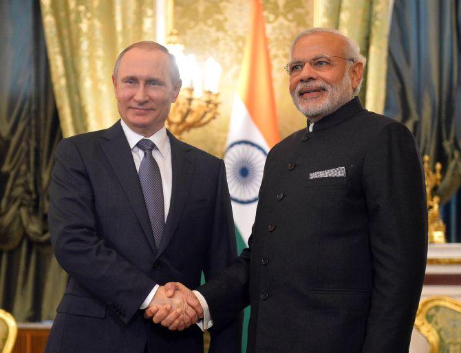 Image result for 1.	Modiâs next tour to Russia is on May 21