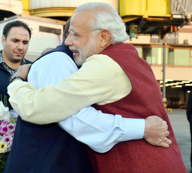 Prime Minister Narendra Modi hugs Pakistan Prime Minister Nawaz Sharif in Lahore, December 25,  2015.