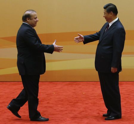 Chinese President Xi Jinping greets Pakistan Prime Minister Nawaz Sharif in Beijing. Photograph: Kim Kyung-Hoon/Reuters