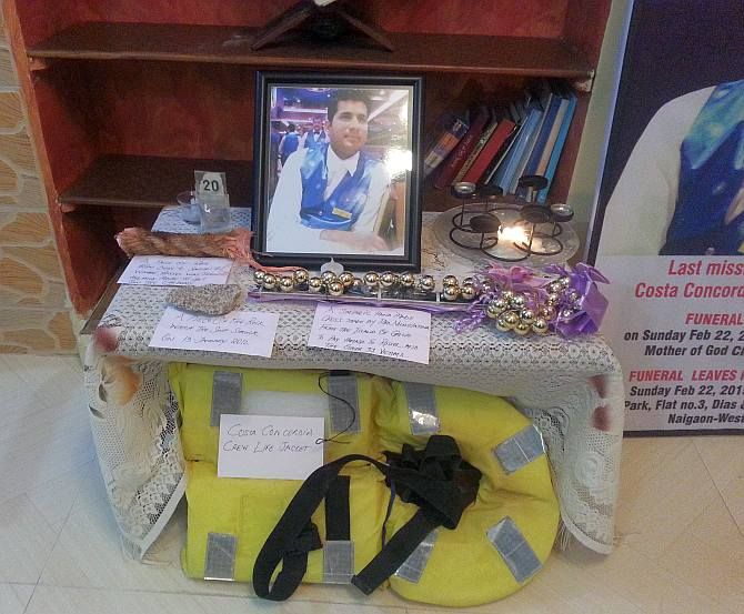 In memory of Russel: Messages from friends and relatives; his life jacket, a small stone from the island and a rope that Kevin collected from Italy was placed in memory of the departed soul