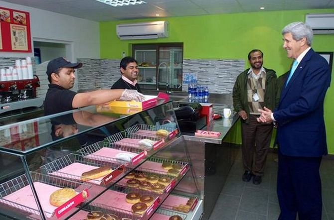 US Secretary of State John Kerry at a Dunkin' Donuts in Islamabad, January 13, 2015.