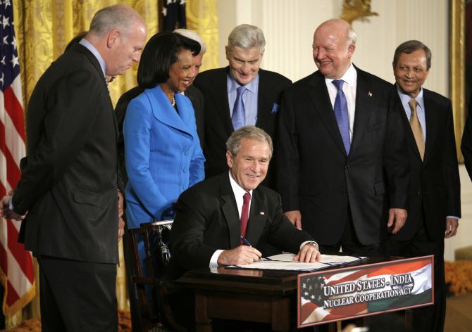 George W Bush, the then US president, signs the United States-India Nuclear Cooperation Approval and Non-proliferation Enhancement Act at the White House, October 8, 2008. Photograph: Kevin Lamarque/Reuters