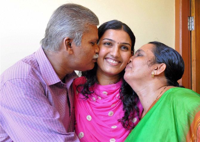 Renu Raj, 2nd rank-holder in UPSC exam, with her parents