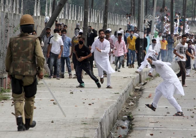 Protesters clash with the police in Srinagar in July 2015. Photograph: Umar Ganie