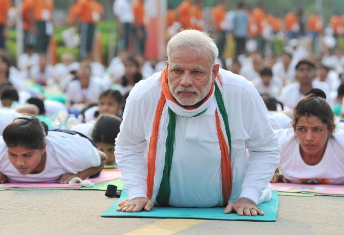 Prime Minister Narendra Modi performed a variety of asanas on Yoga Day at Rajpath in New Delhi. Photograph: @PIB/Twitter