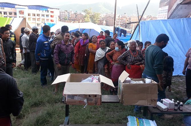 Patients in quake-hit Nepal wait for medical attention and succor.