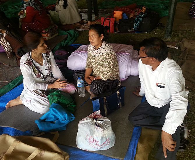 Dr Vani Kori chats with a Nepali woman in quake hit Nepal.