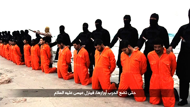Men in orange jumpsuits, said to be Egyptian Christians, minutes before they were murdered by the ISIS.