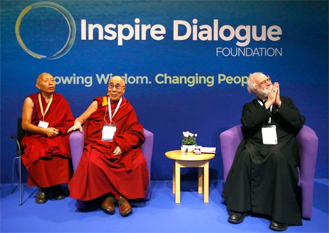 The Dalai Lama with the former Archbishop of Canterbury Lord Williams, right, at Magdalene College in Cambridge, September 16.  Photograph: Darren Staples/Reuters