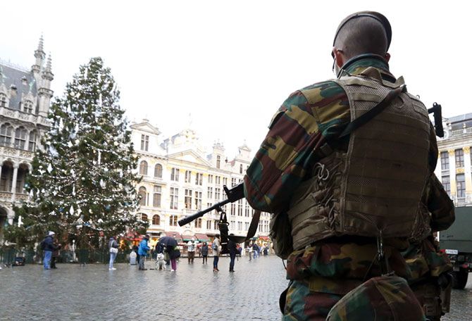 A Belgian soldier keeps guard on Brussels' Grand Place.