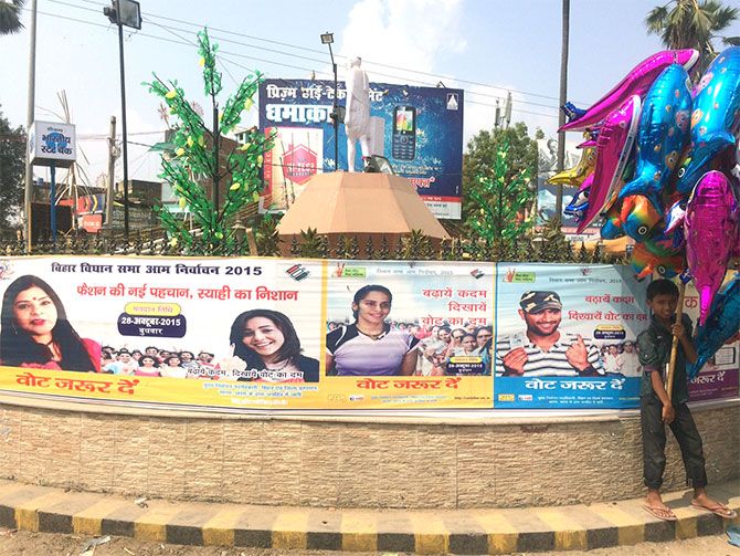 Banners with Mahendra Singh Dhoni, Virat Kohli, Saina Nehwal, Aamir Khan promoting the importance of the vote can be found across Bihar towns and cities. Photograph: Archana Masih/Rediff.com
