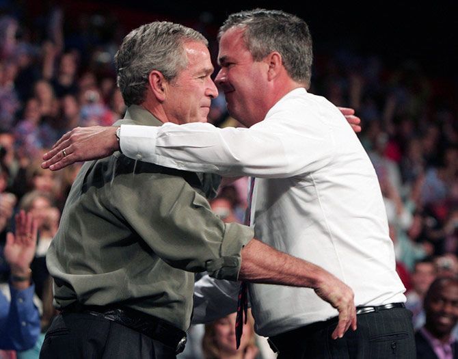 Then President George W Bush hugs his younger brother, then Florida Governor Jeb Bush, at a Republican Party rally in Pensacola, Florida, November 6, 2006. Photograph: Jason Reed/Reuters