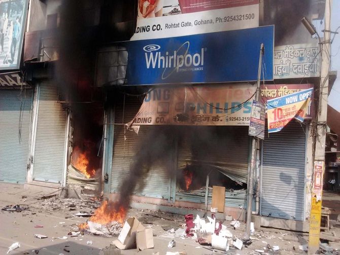 Shops set on fire as the Jat agitation for reservation intensifies in Sonipat.