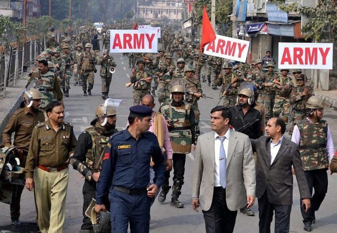 The army carries out a flag march in Rohtak amidst the Jat agitation. Photograph: PTI