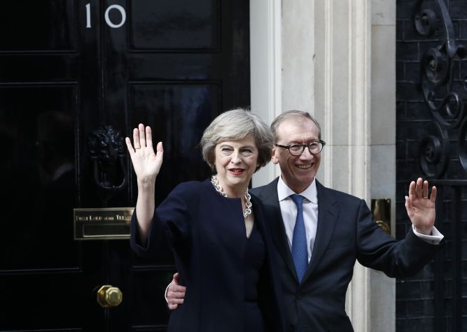 British Prime Minister Theresa May with her husband Philip May. Photograph: Stefan Wermuth/Reuters