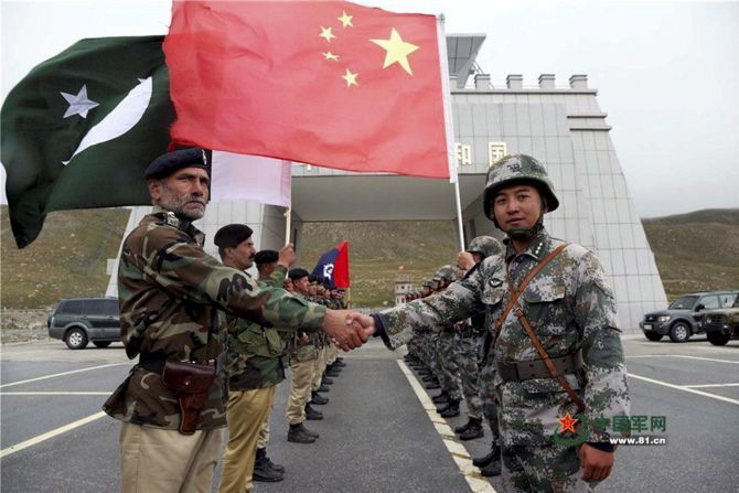 Chinese and Pakistan troops jointly patrolling the border connecting PoK with Xinjiang region.