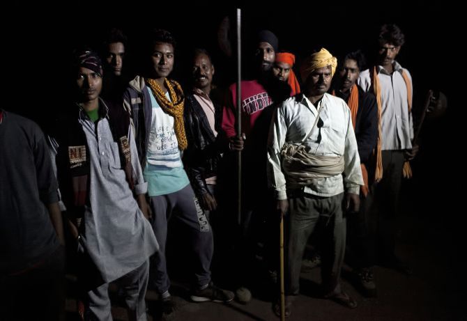 Members of a cow vigilante group out on a patrol in the hopes of stopping vehicles of cow smugglers in Ramgarh, Rajasthan. Photograph: Allison Joyce/Getty Images