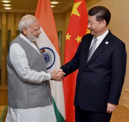Prime Minister Narendra Modi with Chinese President Xi Jinping on the sidelines of the SCO meeting in Tashkent. Photograph: PTI