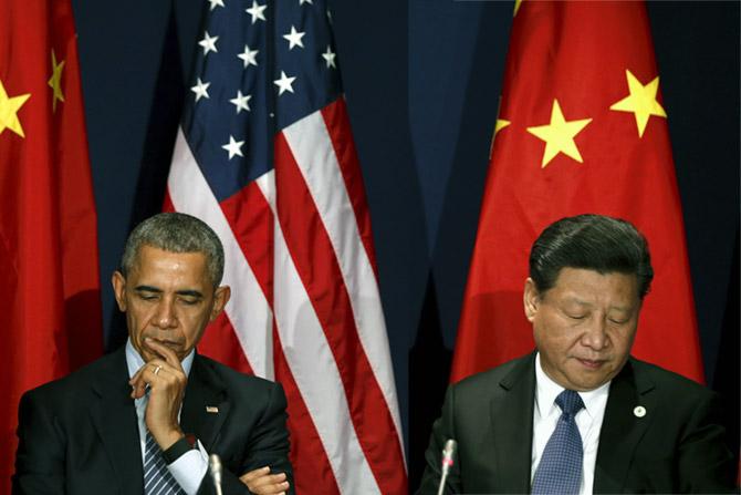 US President Barack Obama with Chinese President Xi Jinping at the climate summit in Paris, November 30, 2015. Photograph: Kevin Lamarque/Reuters