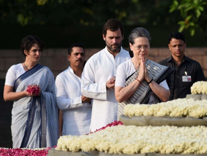 Congress President Sonia Gandhi, her son, party Vice-President Rahul Gandhi and daughter Priyanka GandhI-Vadra play tribute on Rajiv Gandhi's 25th death anniversary, May 21, 2016.Photograph: Manvender Vashist/PTI.