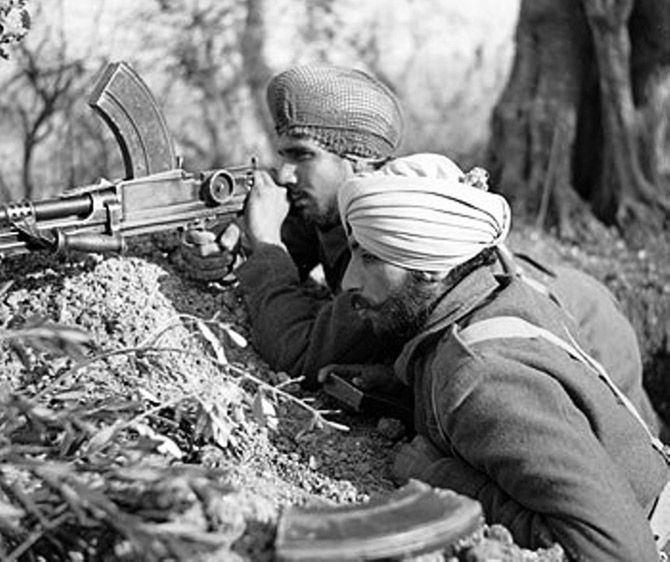 Two Sikh soldiers from the Indian Army use a Bren light machine gun in the Italian campaign near Villa Grande, January 15, 1944. Photograph: Sergeant Loughlin/ No 2 Army Film &amp; Photographic Unit, from the collection of the Imperial War Museum
