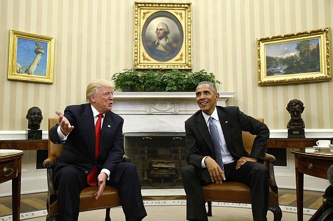 Presidents Donald Trump and Barack Obama in the Oval Office