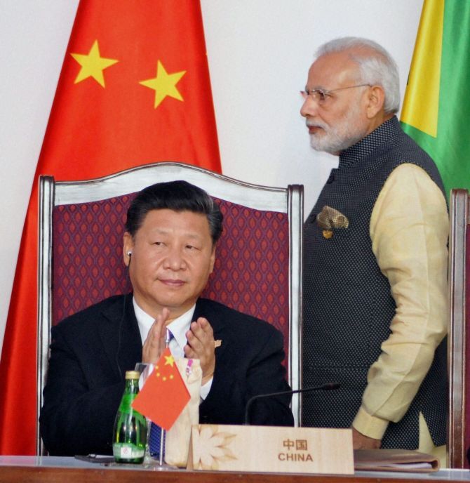 Prime Minister Narendra D Modi and Chinese President Xi Jinping at the BRICS summit in Benaulim, Goa, October 2016. Photograph: PTI Photo