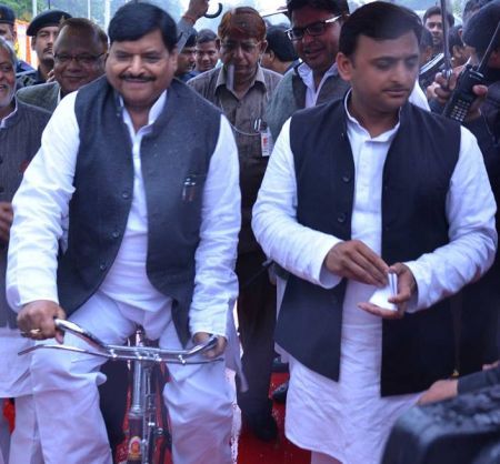 Akhilesh Yadav has fallen out bitterly with his uncle Shivpal Yadav, seen here astride the Samajwadi Party's election symbol, the cycle.