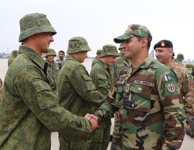 Russian and Pakistani soldiers at the military exercise. Photograph: @AsimBajwaISPR/Twitter