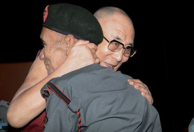 Dalai Lama and soldier