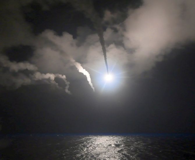 A US Tomahawk missile heads for the al-Shayrat military airfield near Homs in Syria. Photograph: US Department of Defence/Reuters