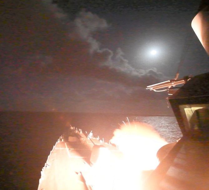 The USS Ross fires a Tomahawk missile at the Syrian air base. Photograph: US Department of Defence/Reuters