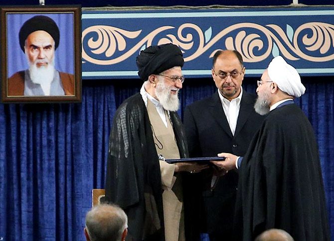 Iranian President Hassan Rouhani receives the presidential mandate from Iran's Supreme Leader Ayatollah Ali Khamenei at an endorsement ceremony, Tehran, August 3, 2017. Photograph: President.ir/Handout/Reuters