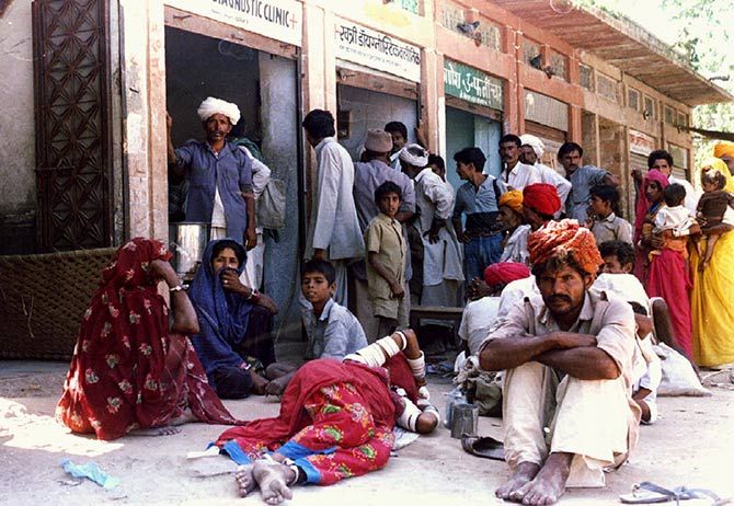 Suspected malaria victims wait outside a private clinic in Barmer town, Rajasthan. Photograph: Sunil Malhotra/Reuters