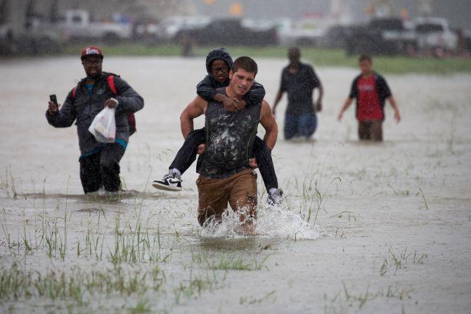 Image result for Indian Americans  helping food for thousands in Houston