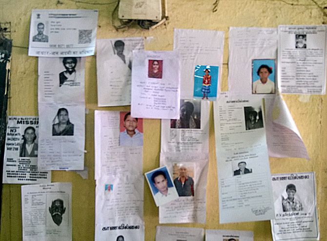 Photos of missing persons at the railways police station in Chennai