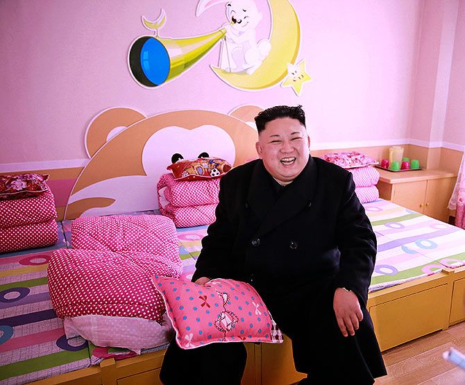 North Korea's leader Kim Jong-un at the Pyongyang Orphans Primary School. Photograph: Korean Central News Agency/Reuters