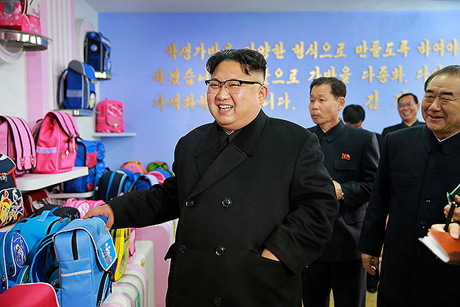 Kim Jong-un visits a newly built Pyongyang bag factory. Photograph: Korean Central News Agency/Reuters