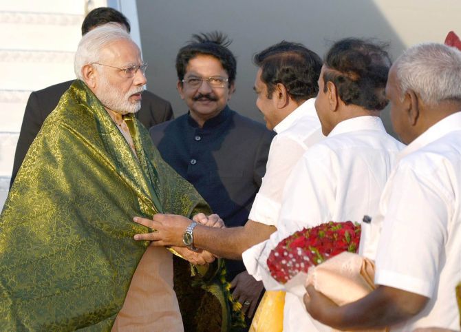 Prime Minister Narendra D Modi welcomed by Tamil Nadu Chief Minister Edappadi K Palaniswami in Coimbatore, February 24, 2017.