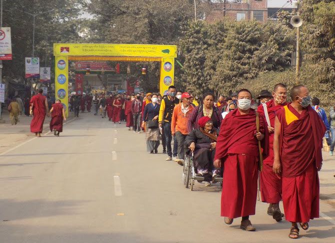 Monks and others on their way to the venue of the Kalachakra Puja