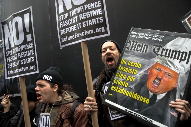 Protesters compare Trump to Hitler in a protest in New York City, January 20, 2017. Photograph: Drew Angerer/Getty Images