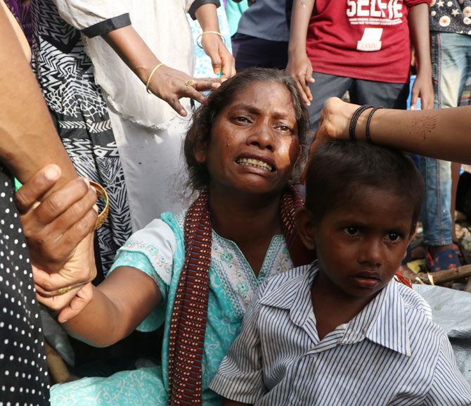 Poonam Doiphode is inconsolable after the loss of her children.