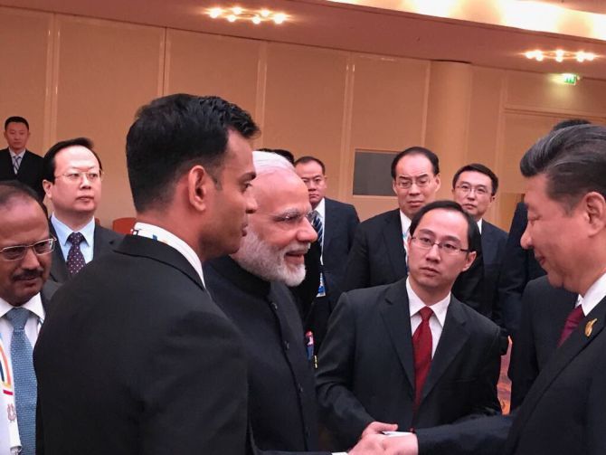 Prime Minister Narendra Modi meets Chinese President Xi Jinping at the BRICS leaders' informal gathering on the sidelines of the G20 summit in Hamburg, Germany, July 7, 2017. Photograph: @MEAIndia/Twitter