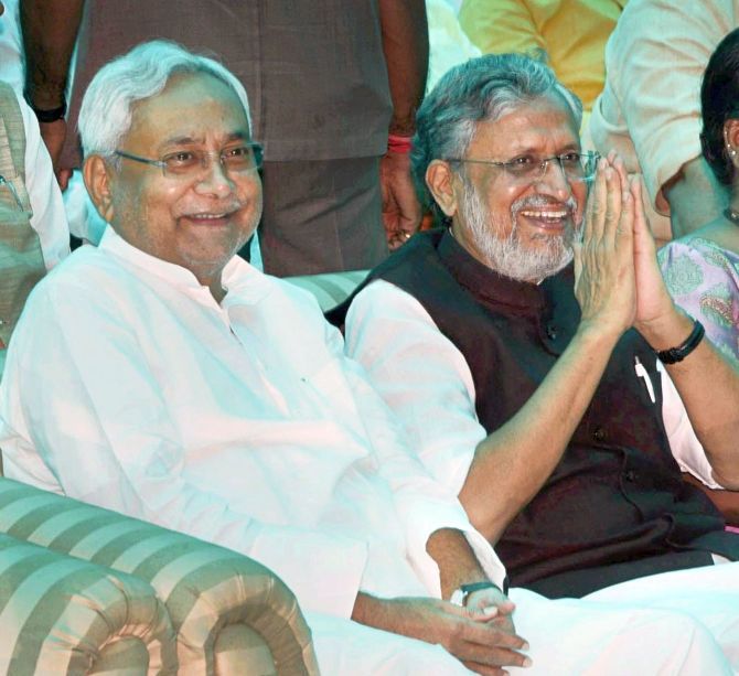 Bihar Chief Minister Ntish Kumar and Deputy Chief Minister Sushil Kumar Modi after they were sworn in on July 27, 2017. Photograph: PTI Photo