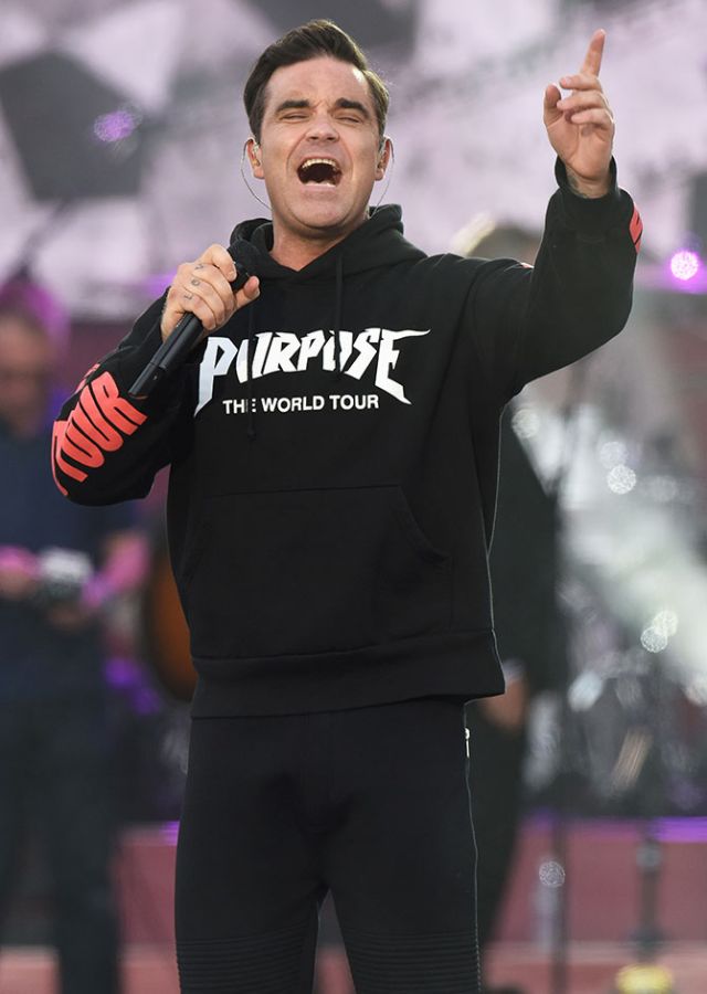NO SALES, free for editorial use. In this handout provided by 'One Love Manchester' benefit concert Robbie Williams performs on stage on June 4, 2017 in Manchester, England. Donate at www.redcross.org.uk/love  (Photo by Getty Images/Dave Hogan for One Love Manchester)