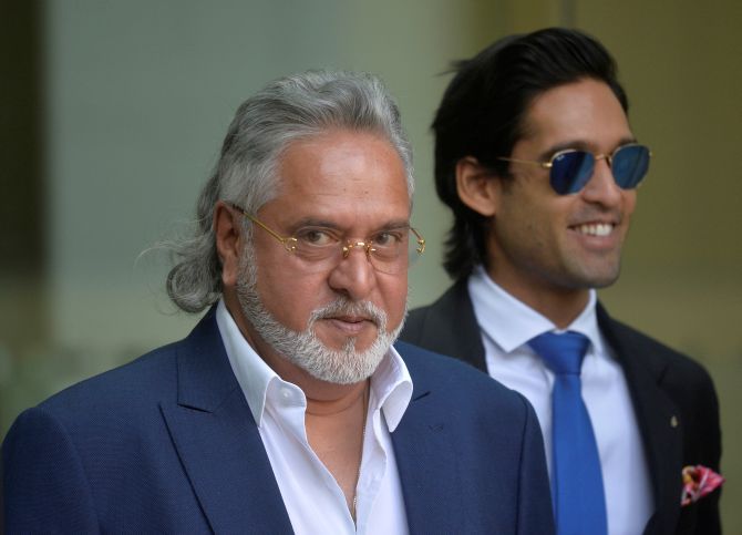 Vijay Mallya, accompanied by his son Siddharth Mallya, leaves the Westminster magistrates court, June 13, 2017 after an extradition hearing. Photograph: Hannah McKay/Reuters